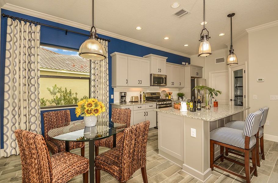 Representative furnished interior of a home built from the Endless Summer 4 by Neal Communities in Wildleaf, Parrish (Image 8).