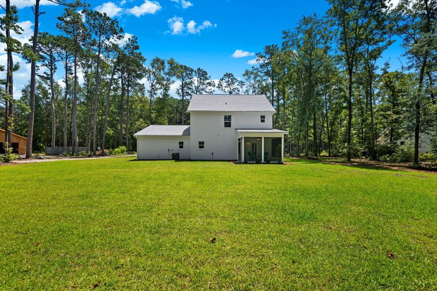 Exterior details and patio area of a home in , Johns Island (Image 3).