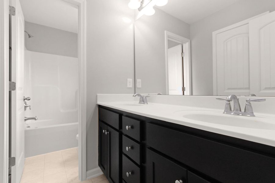 Representative furnished interior of a home built from the Furyk by RiverWILD Homes in Riverwood Ranch, Clayton (Image 10).