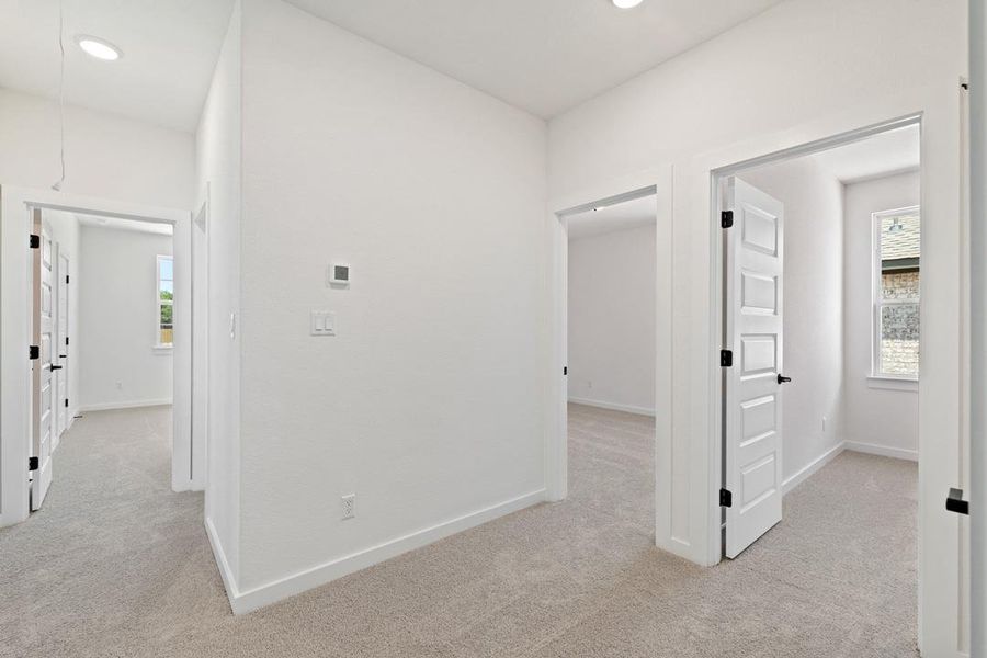 Spacious, unfurnished interior of a new home in Heritage, Dripping Springs (Image 37).