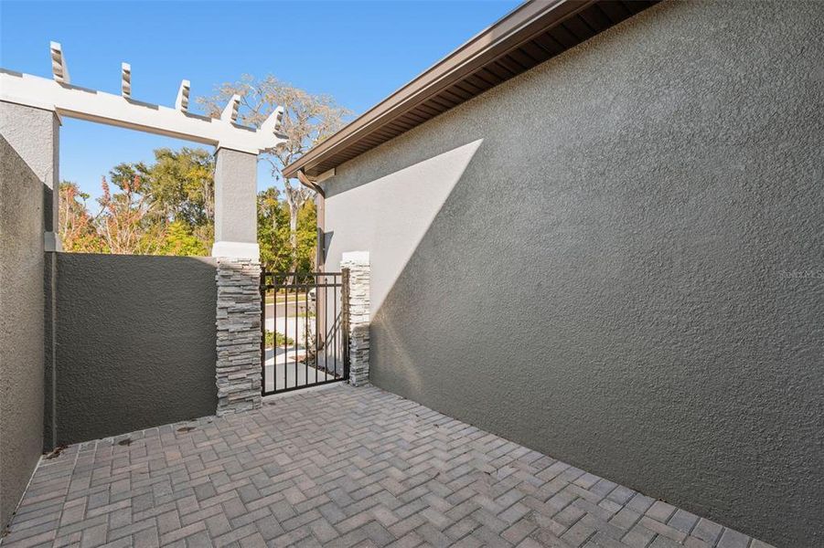 Exterior details and patio area of a home in Villas Del Lago, Lutz (Image 34).