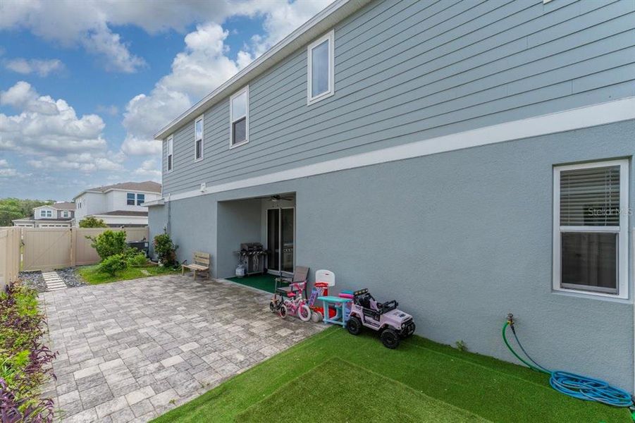 Exterior details and patio area of a home in Urban Collection at Big Sky, Kissimmee (Image 23).