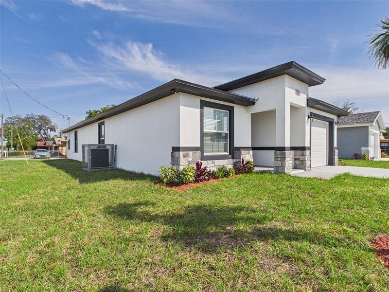 Front exterior of a new home in , Lakeland, FL, highlighting curb appeal (Image 2). Front exterior of a new home in , Lakeland, FL, highlighting curb appeal (Image 2).
