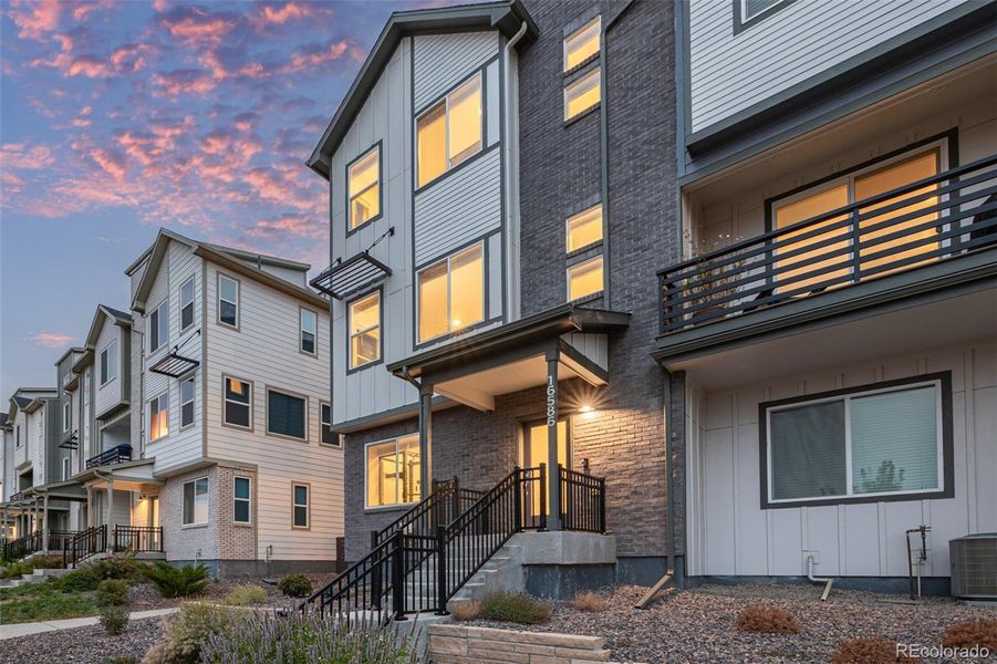 Front exterior of a new home in , Broomfield, CO, highlighting curb appeal (Image 18).