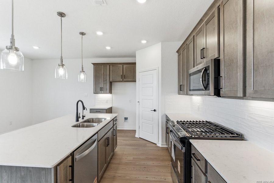 Furnished interior view inside a new home in Nopal Valley, San Antonio (Image 18).