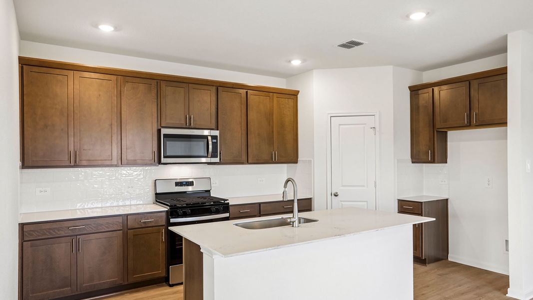 Furnished interior view inside a new home in Briarwood, Elgin (Image 7).