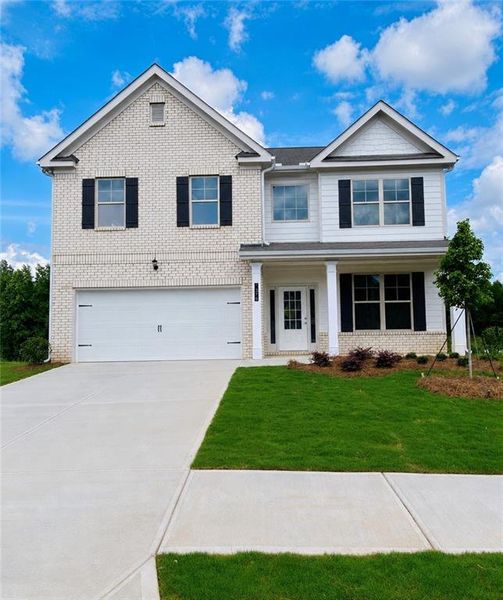 Front exterior of a new home in Hellen Valley, Braselton, GA, highlighting curb appeal (Image 20). Front exterior of a new home in Hellen Valley, Braselton, GA, highlighting curb appeal (Image 20).