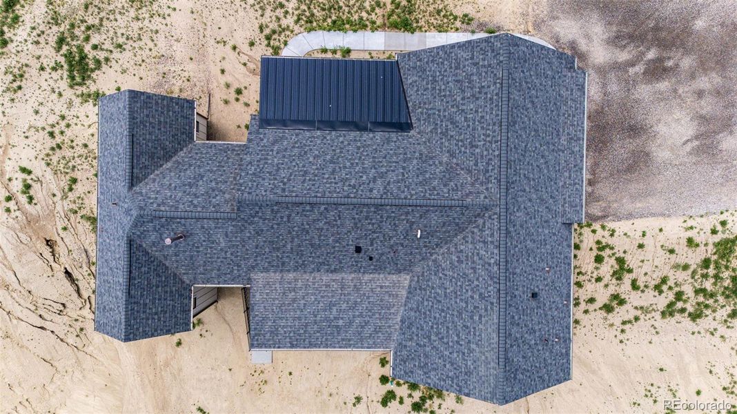 Front exterior of a new home in , Byers, CO, highlighting curb appeal (Image 25).