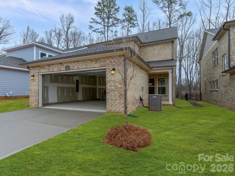 Exterior details and patio area of a home in Whitley Preserve – Park Collection, Mint Hill (Image 16).