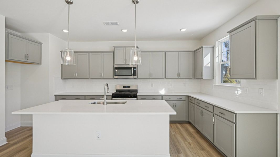 Representative furnished interior of a home built from the Wagener by DRB Homes in Station Pointe, Angier (Image 14).
