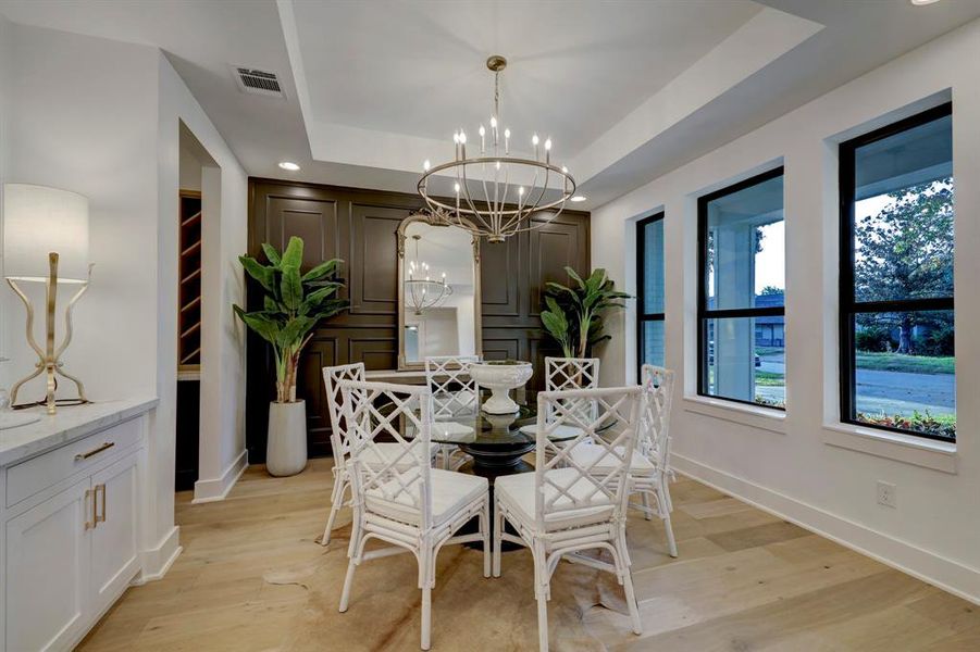 Formal dining room with accent wall*photos are of a previously constructed home by the builder. 1406 Thornton may have different selections at builders sole discretion. These photos are not meant to be an exact representation of 1406 Thornton.