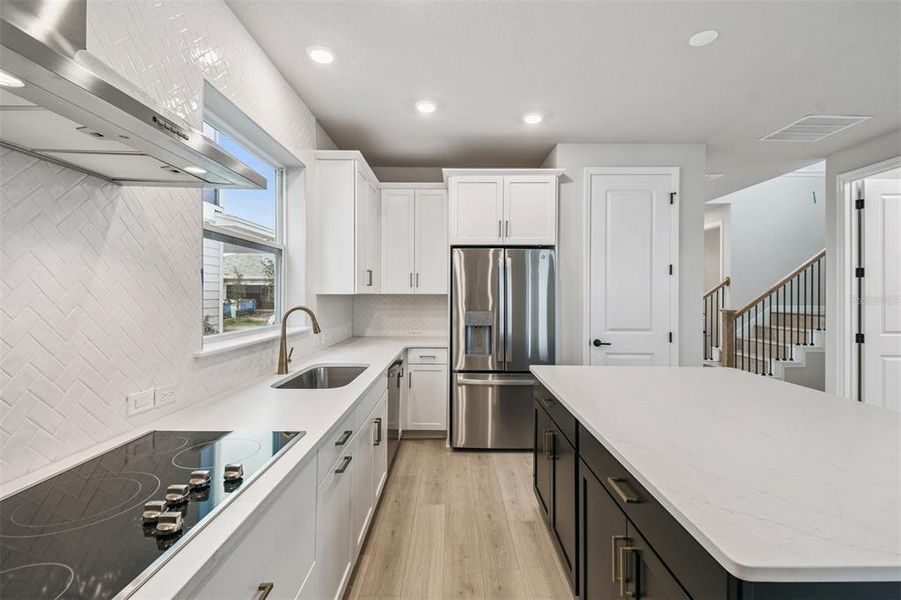 Furnished interior view inside a new home in Weslyn Park in Sunbridge 34', St. Cloud (Image 7).