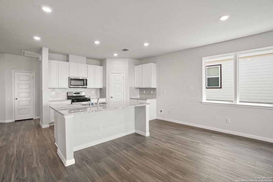 Furnished interior view inside a new home in Hunters Ranch, San Antonio (Image 10).