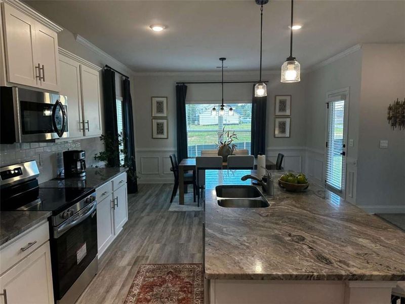 Furnished interior view inside a new home in Canterbury Villas, Carrollton (Image 3).