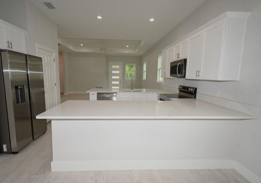 Furnished interior view inside a new home in , Dade City (Image 9).