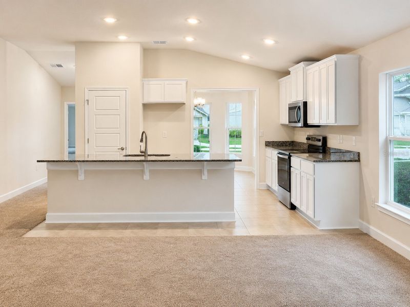 Furnished interior view inside a new home in Harmony Central, St. Cloud (Image 5).