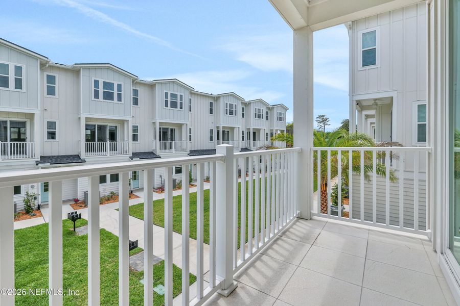Exterior details and patio area of a home in North Beach Townhomes, Jacksonville Beach (Image 3). Exterior details and patio area of a home in North Beach Townhomes, Jacksonville Beach (Image 3).