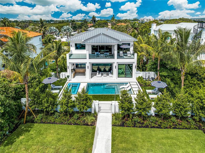 Front exterior of a new home in , Ocean Ridge, FL, highlighting curb appeal (Image 36).