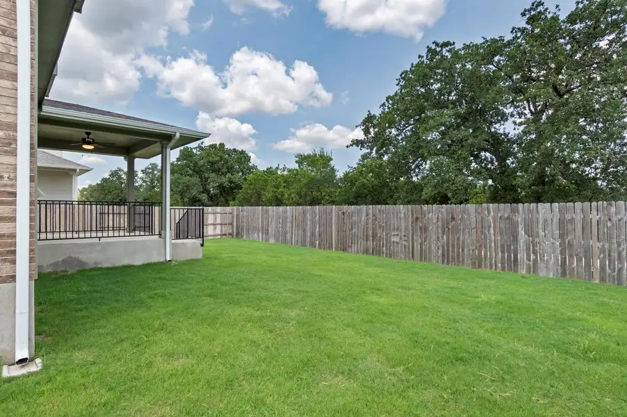 Exterior details and patio area of a home in Grande Estates, Bertram (Image 4). Exterior details and patio area of a home in Grande Estates, Bertram (Image 4).