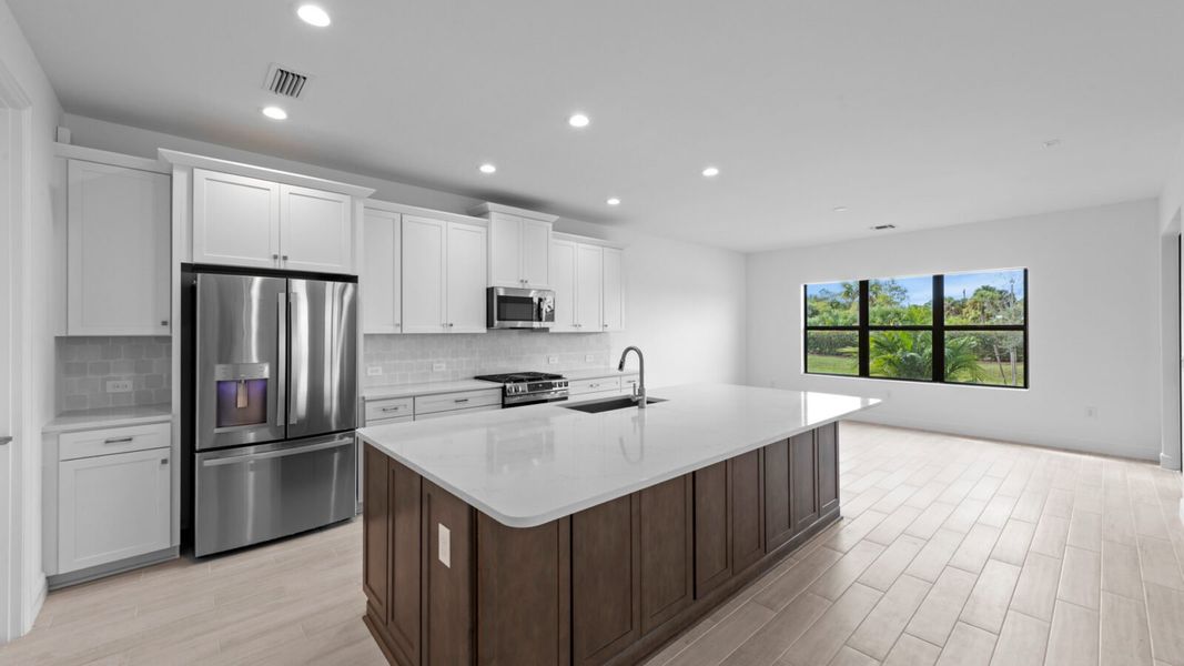 Furnished interior view inside a new home in SkySail, Naples (Image 8).