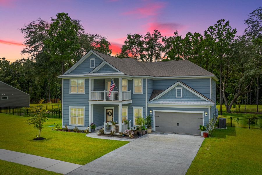 Front exterior of a new home in Sea Island Preserve, Johns Island, SC, highlighting curb appeal (Image 2).
