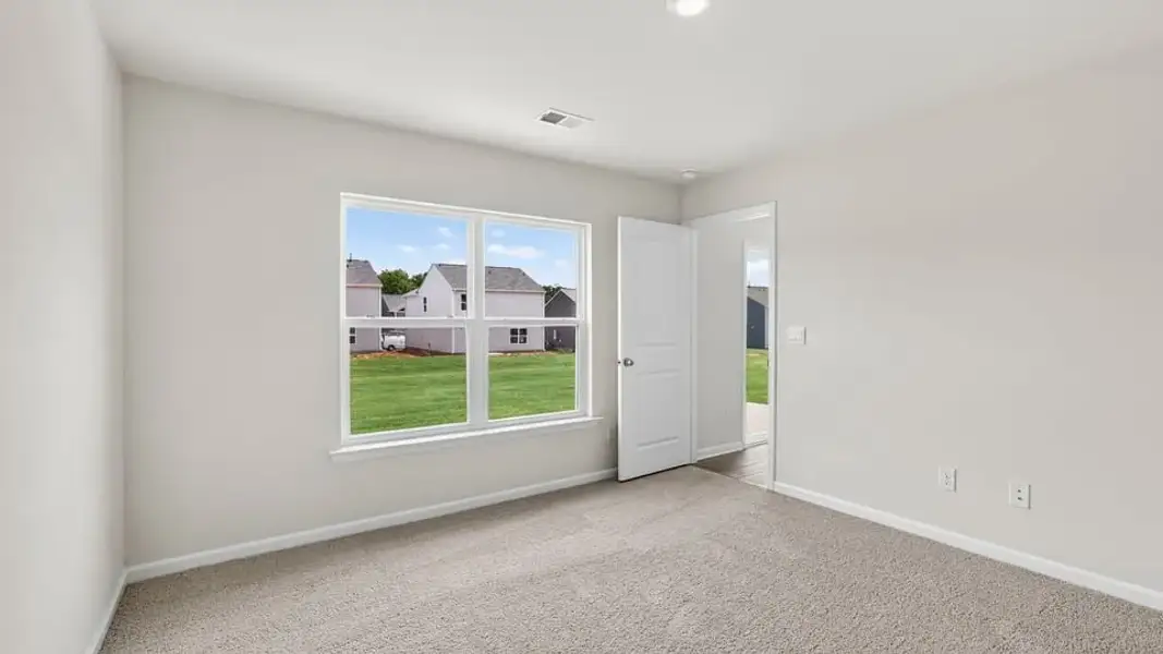 Spacious, unfurnished interior of a new home in Waverly Station, Greenwood (Image 32).