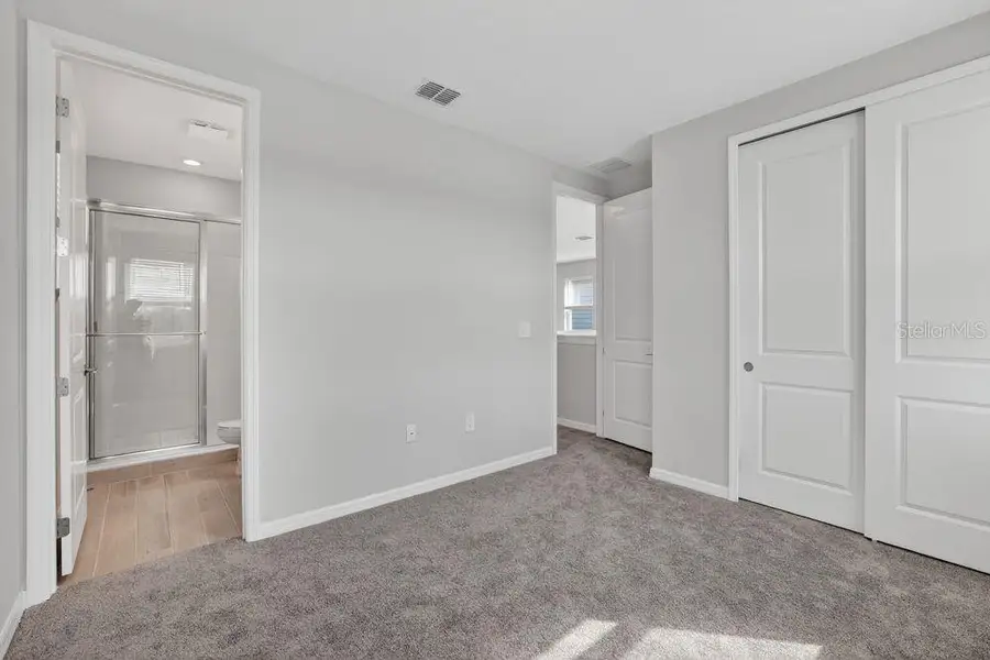 Spacious, unfurnished interior of a new home in Firethorn, Parrish (Image 32).