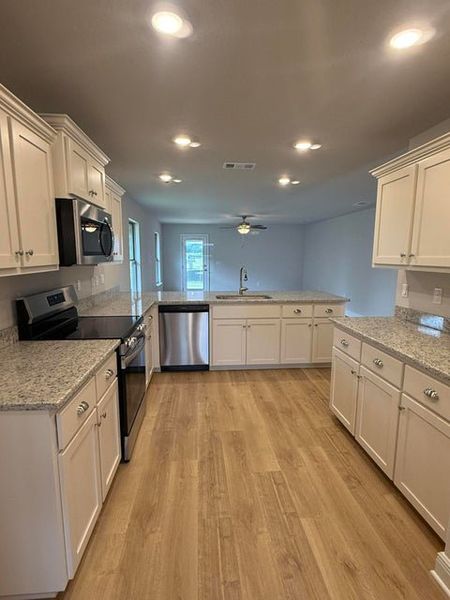 Furnished interior view inside a new home in Ridgeway Landing, Crestview (Image 4).