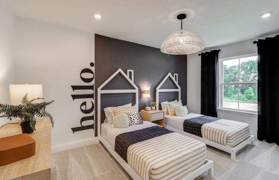 Serene window-filled secondary bedroom perfect for