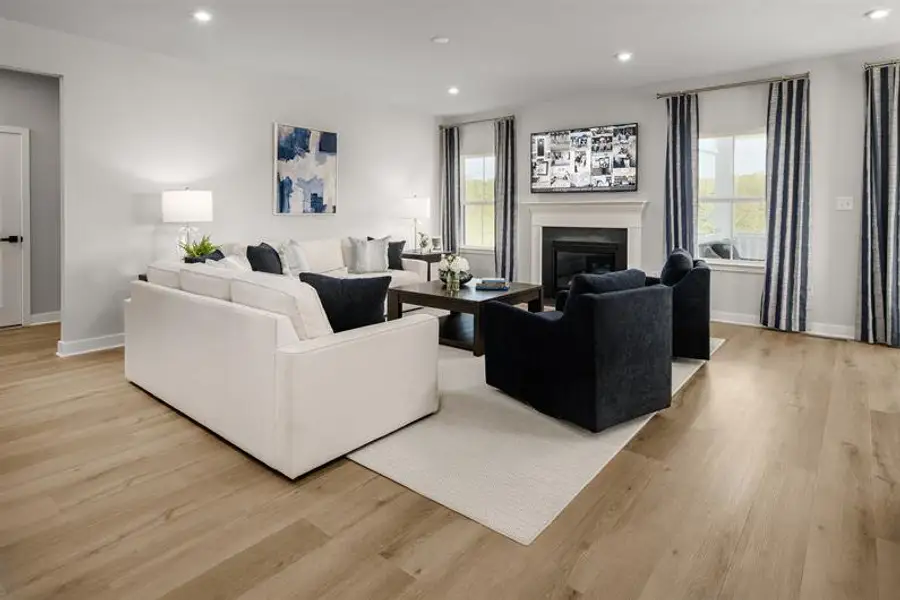 Furnished interior in a model home at Derby Meadows in Pleasant View (Image 14).