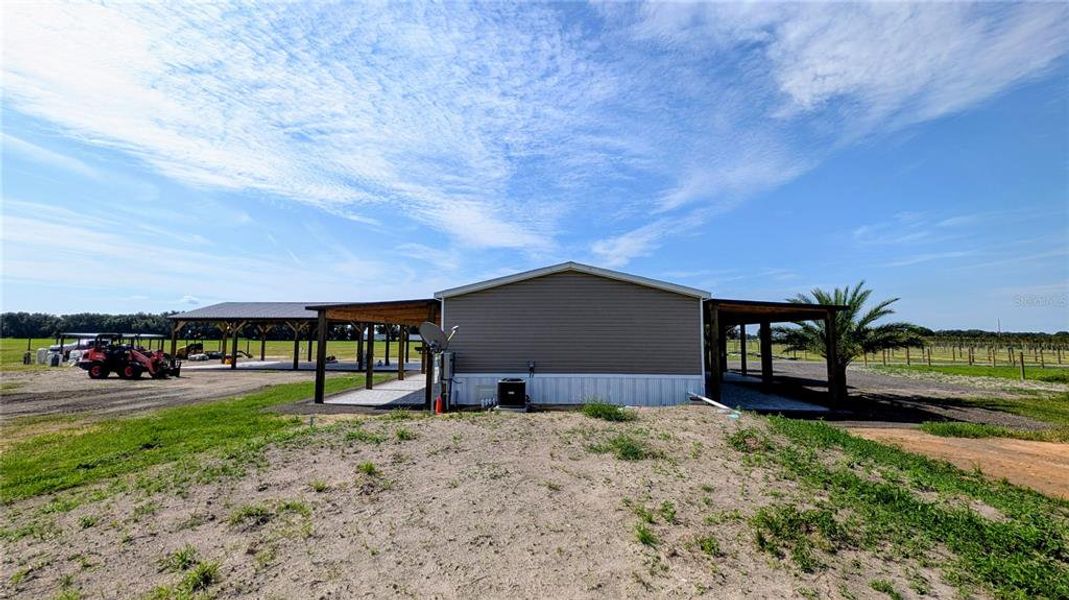 Exterior details and patio area of a home in , Wauchula (Image 18).