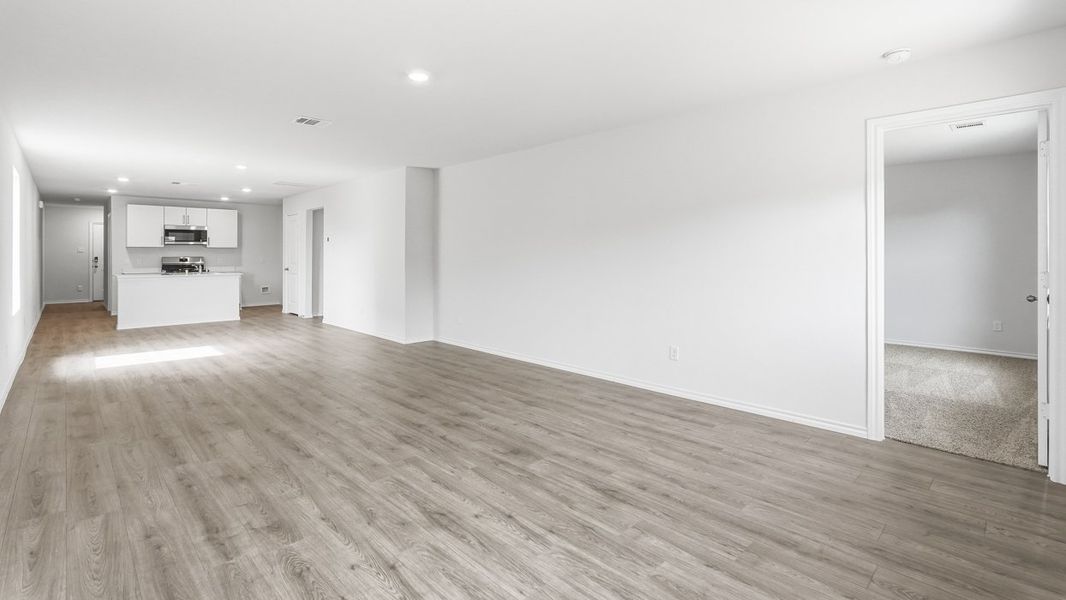 Representative unfurnished interior of a home built from the Caprock by D.R. Horton in Maplewood Meadows, Talty (Image 7).