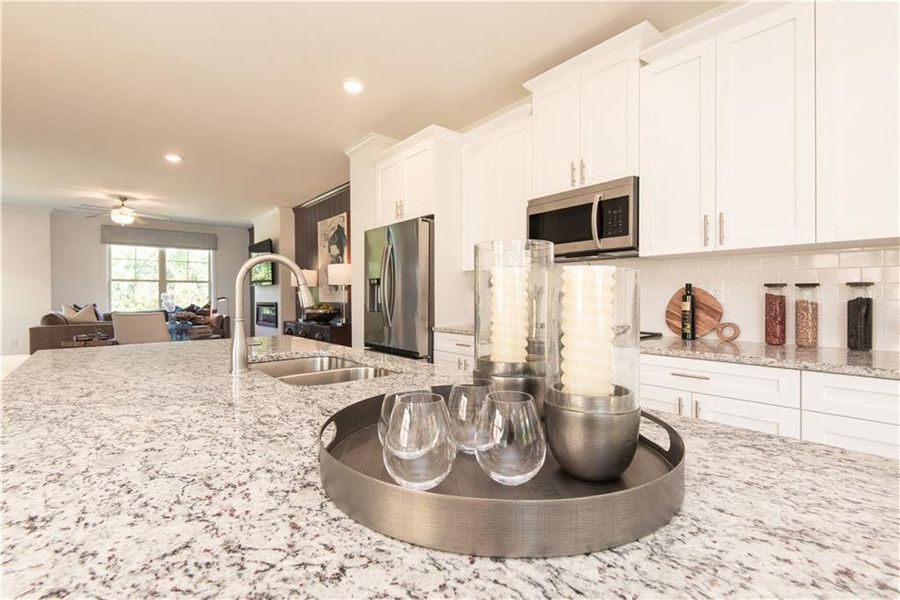 Furnished interior view inside a new home in Towns at Enclave, Lawrenceville (Image 10). Furnished interior view inside a new home in Towns at Enclave, Lawrenceville (Image 10).