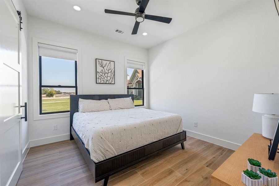 Furnished interior view inside a new home in , Pelican Bay (Image 7).