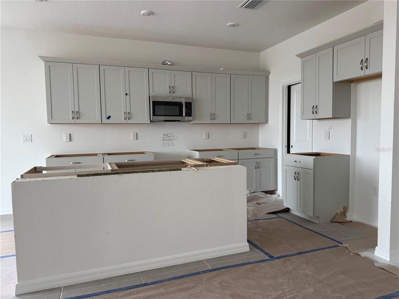 In-progress construction of a new home in Coasterra, Palmetto, FL (Image 22).