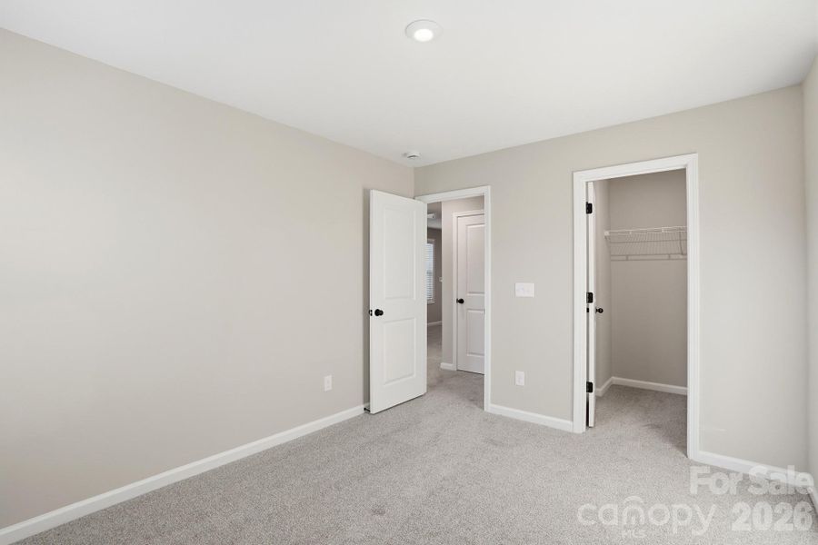 Bedroom Two with Walk-In Closet, Upper Level