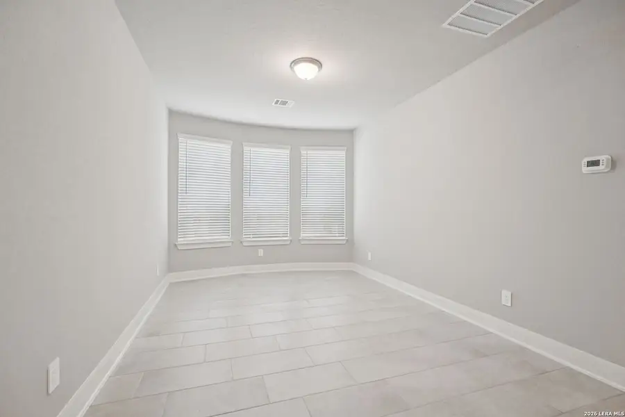 Spacious, unfurnished interior of a new home in Estancia Ranch - Premier Series, San Antonio (Image 36).