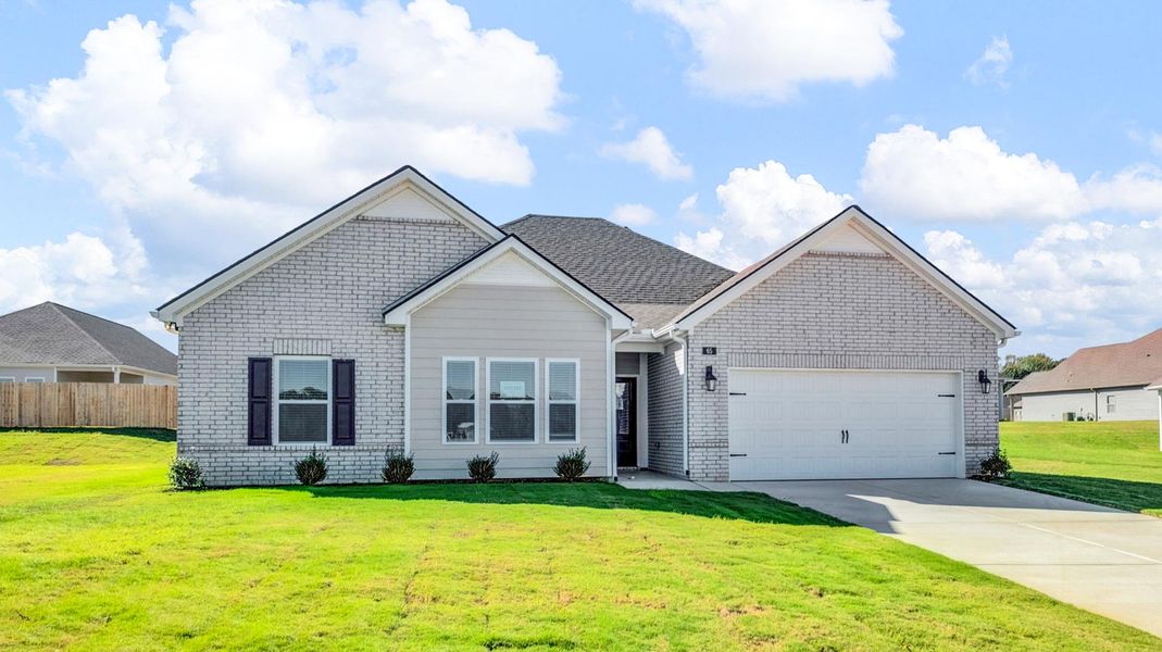 Front exterior of a new home in Riverwood Gardens, Oakland, TN, highlighting curb appeal (Image 2).
