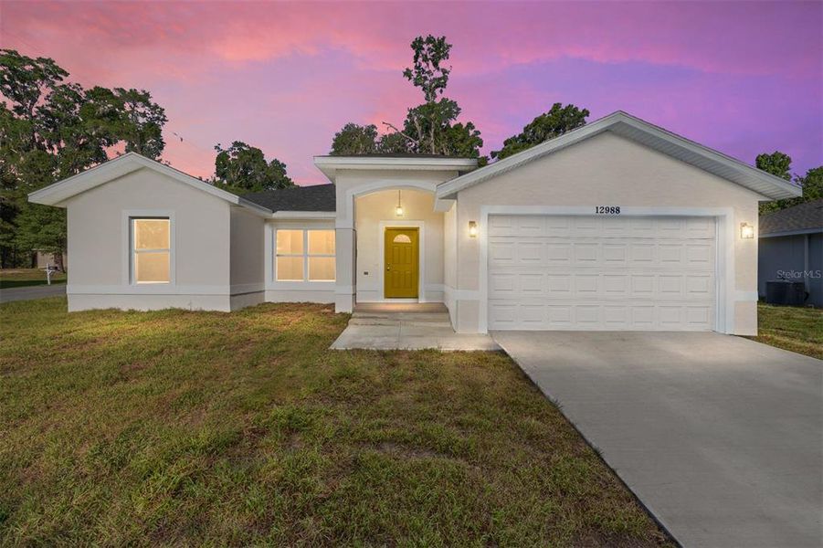 Front exterior of a new home in , Summerfield, FL, highlighting curb appeal (Image 17). Front exterior of a new home in , Summerfield, FL, highlighting curb appeal (Image 17).