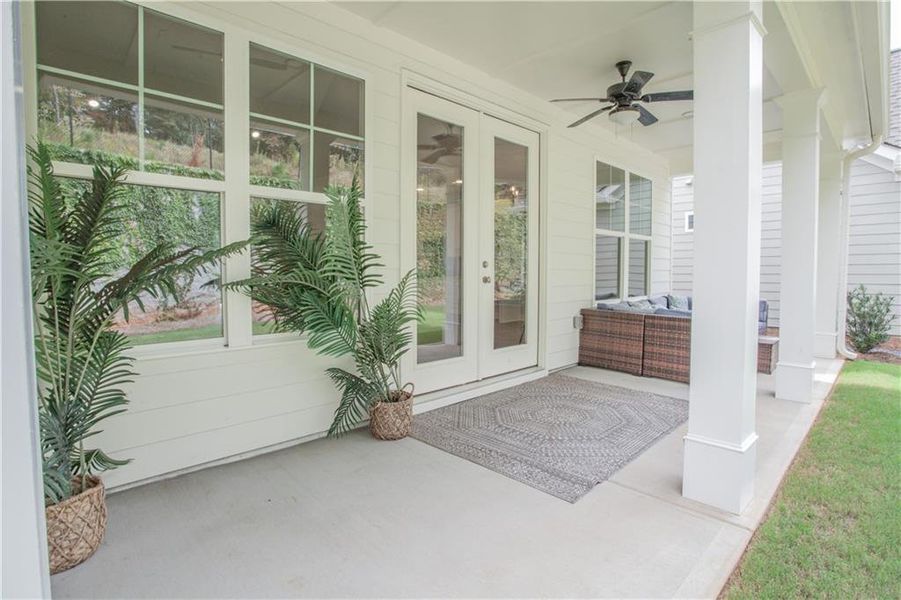 Exterior details and patio area of a home in The Birches on Maple, Carrollton (Image 2).
