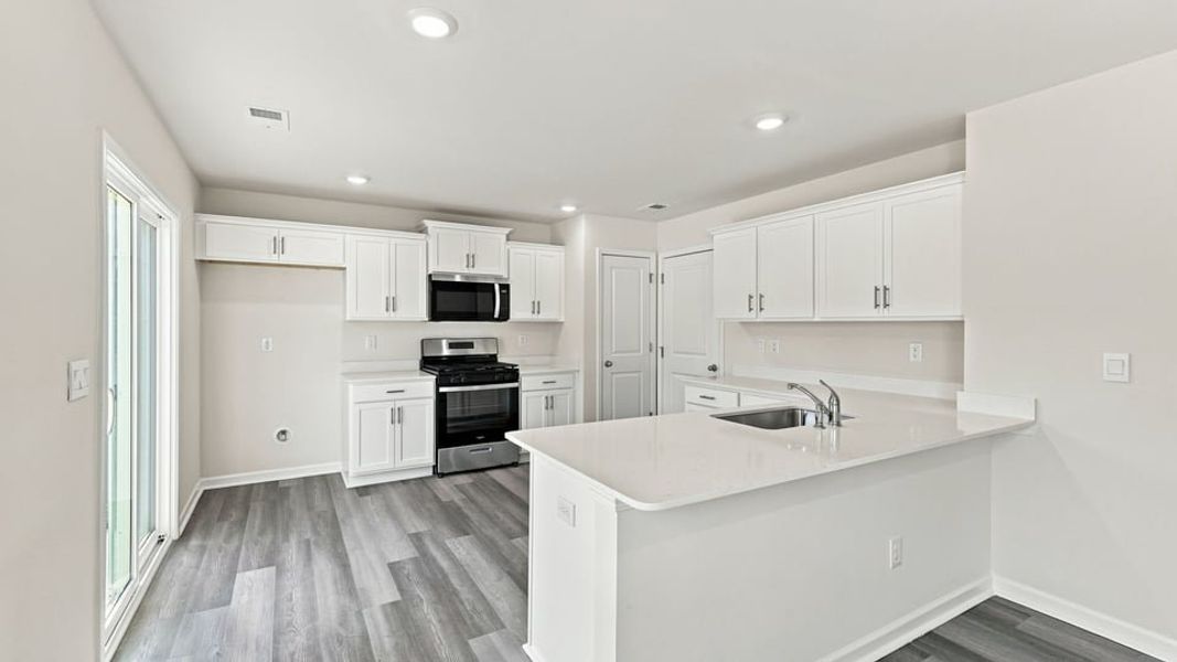 Furnished interior view inside a new home in Harper Ridge, Roebuck (Image 8).