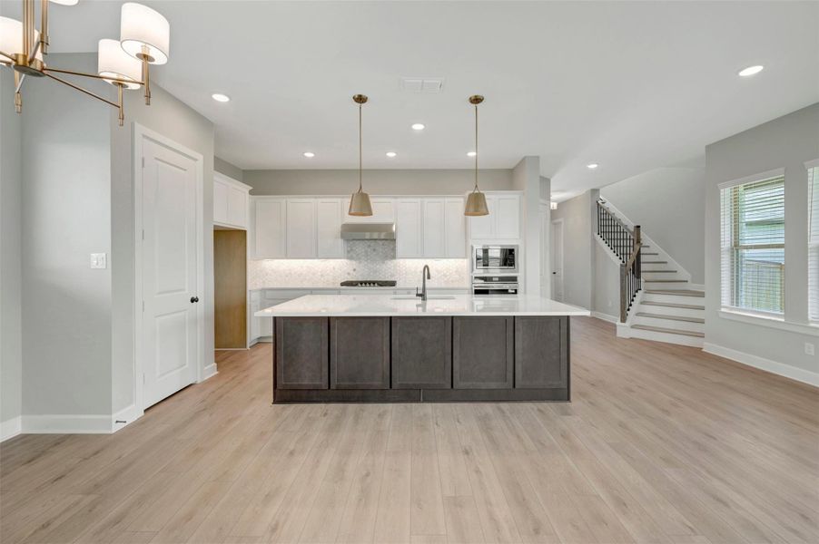 Furnished interior view inside a new home in Prairieland Village - Grove Collection, Cypress (Image 7). Furnished interior view inside a new home in Prairieland Village - Grove Collection, Cypress (Image 7).