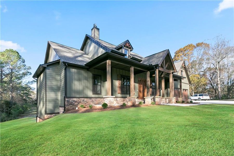 Front exterior of a new home in , Carrollton, GA, highlighting curb appeal (Image 25).
