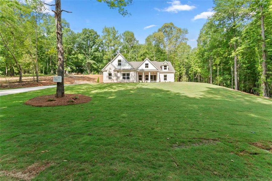 Front exterior of a new home in , Maysville, GA, highlighting curb appeal (Image 27).