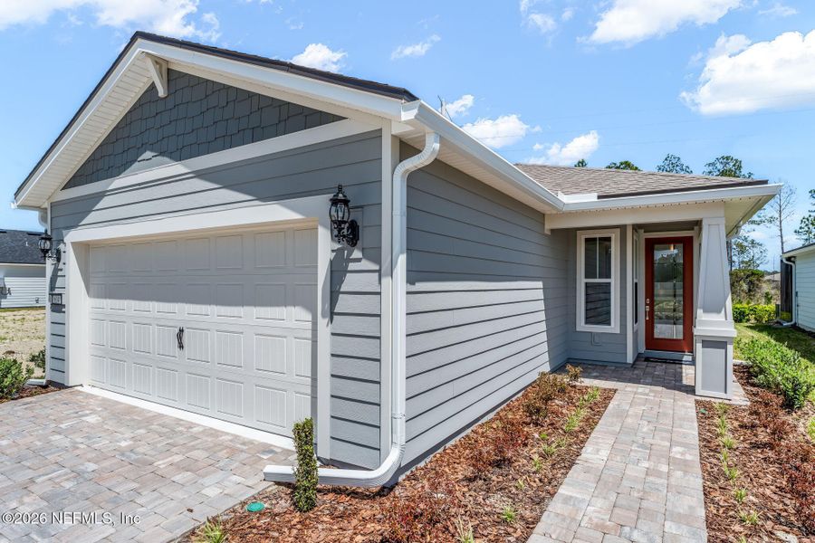 Exterior details and patio area of a home in Del Webb Wildlight, Yulee (Image 4).