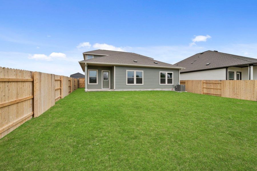 Rear of Home and Private Backyard