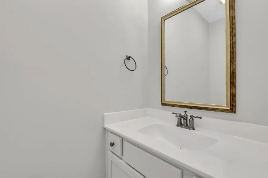 Sherwood – Powder Room with Gold-Tone Framed Mirror