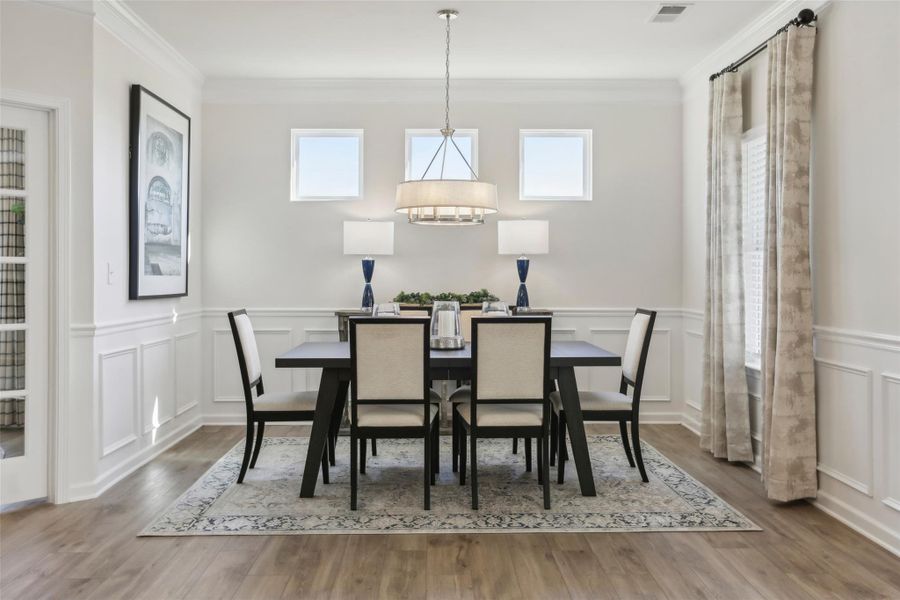 The Avondale- Dining Area. Sample floor plan photo used for illustrative purposes only. Upgrades, selections options, windows and colors may vary.