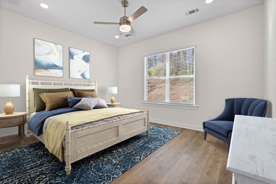 Bedroom with recessed lighting, hardwood / wood-style floors, and ceiling fan