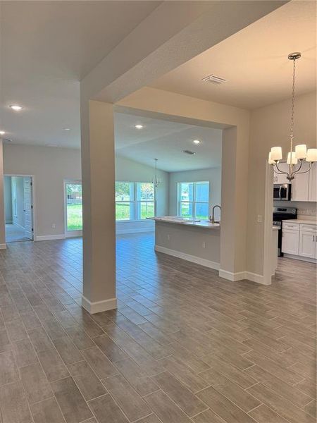 Spacious, unfurnished interior of a new home in Watercress Cove, North Port (Image 6).